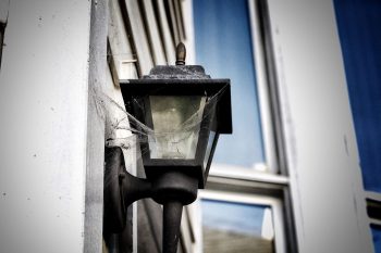cobwebs on a porch lamp in San Francisco